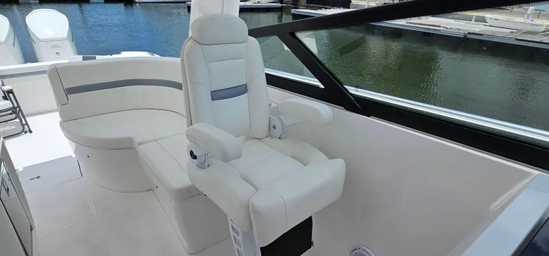 Slide: The Image of Luxurious seating area on the 2022 Intrepid 438 Evolution yacht. - 13
