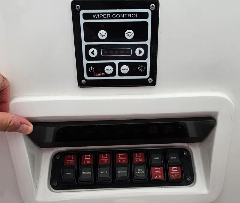 Slide: The Image of 2022 Intrepid 438 Evolution wiper control panel and switchboard. - 24