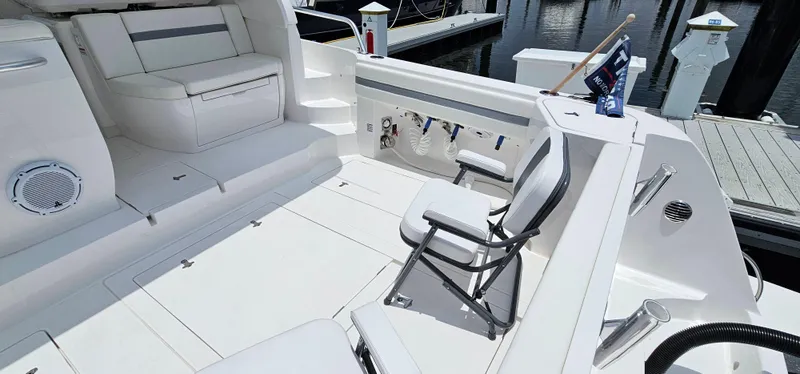 Slide: The Image of 2022 Intrepid 438 Evolution boat deck with seating and fishing equipment. - 7