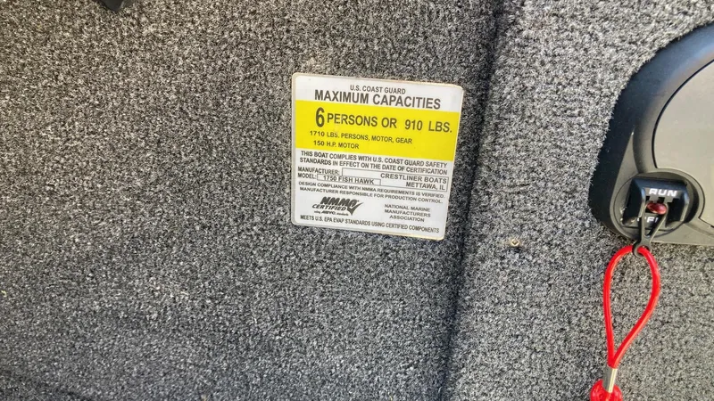Slide: The Image of 2021 Crestliner 1750 Fish Hawk WT JS capacity label, 6 persons or 910 lbs. - 9