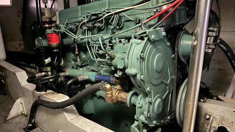 Slide: The Image of Engine of a 1969 Grand Banks 42 Classic boat, showcasing intricate mechanical details. - 18