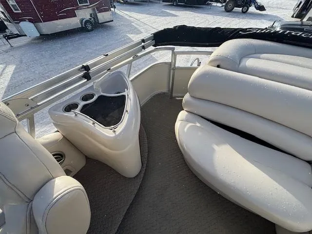 Slide: The Image of 2008 Sun Tracker PARTY BARGE 22 Regency Edition interior with seating and cup holders. - 11