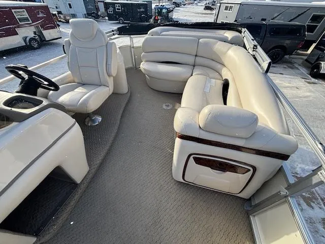 Slide: The Image of 2008 Sun Tracker PARTY BARGE 22 Regency Edition with beige seating and steering console. - 16