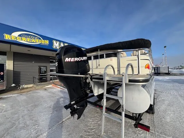 Slide: The Image of 2008 Sun Tracker PARTY BARGE 22 with Mercury engine at dealership in snowy setting. - 20