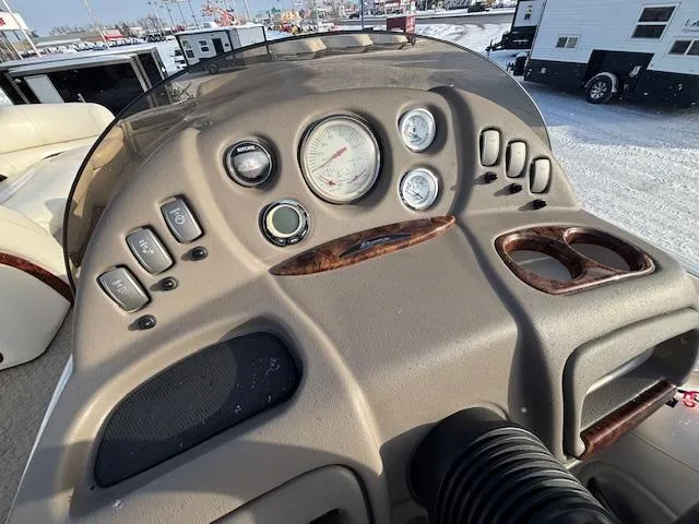 Slide: The Image of 2008 Sun Tracker PARTY BARGE 22 Regency Edition dashboard with gauges and controls. - 6
