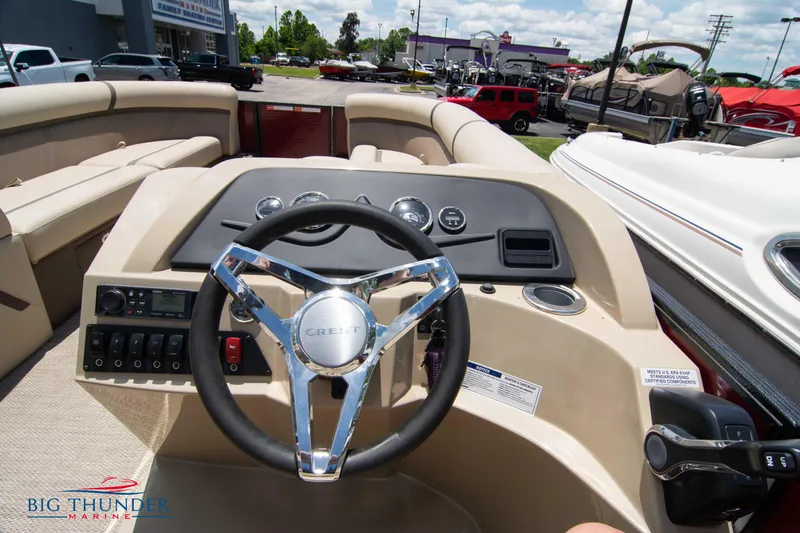 Slide: The Image of 2023 Crest CLASSIC LX 240 SLC boat dashboard and steering wheel at Big Thunder Marine. - 16