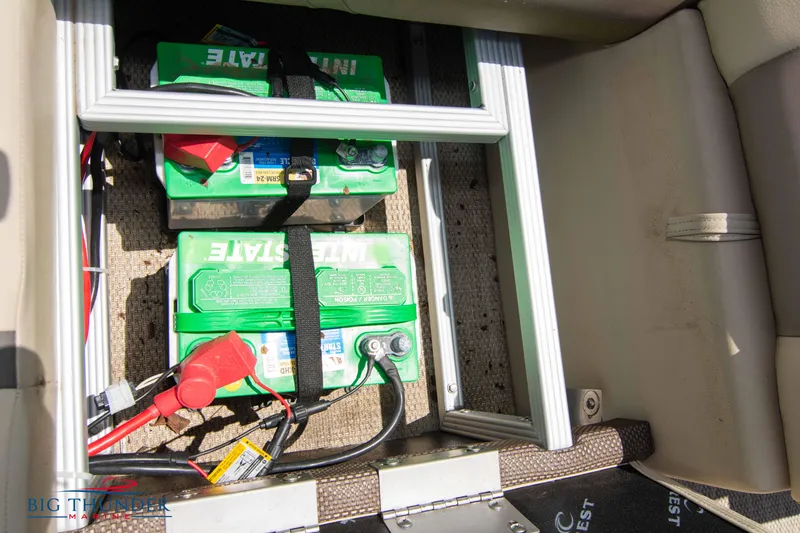Slide: The Image of Battery compartment of 2023 Crest CLASSIC LX 240 SLC boat with Interstate batteries. - 32