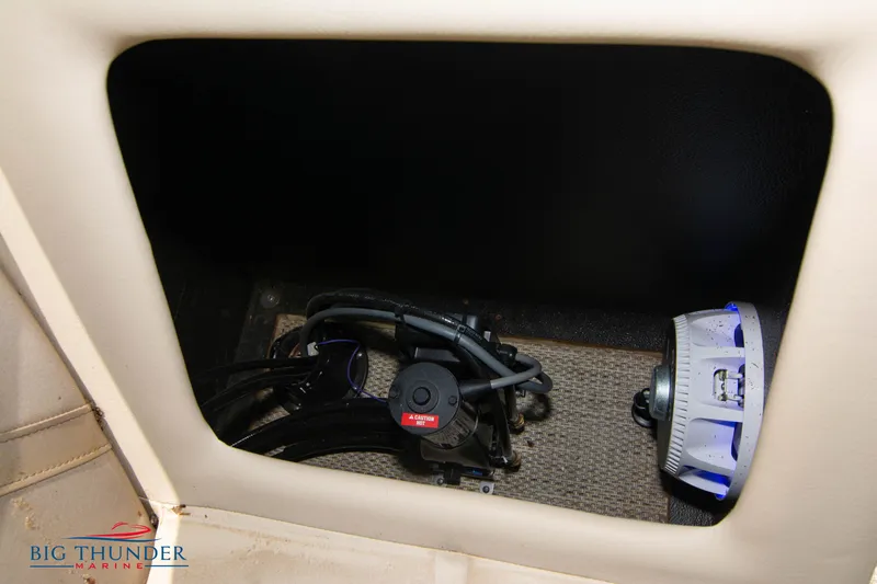 Slide: The Image of Storage compartment of 2023 Crest CLASSIC LX 240 SLC boat with equipment. - 33