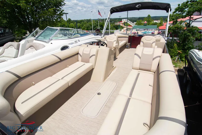 Slide: The Image of 2023 Crest CLASSIC LX 240 SLC pontoon boat with spacious seating and modern design. - 6