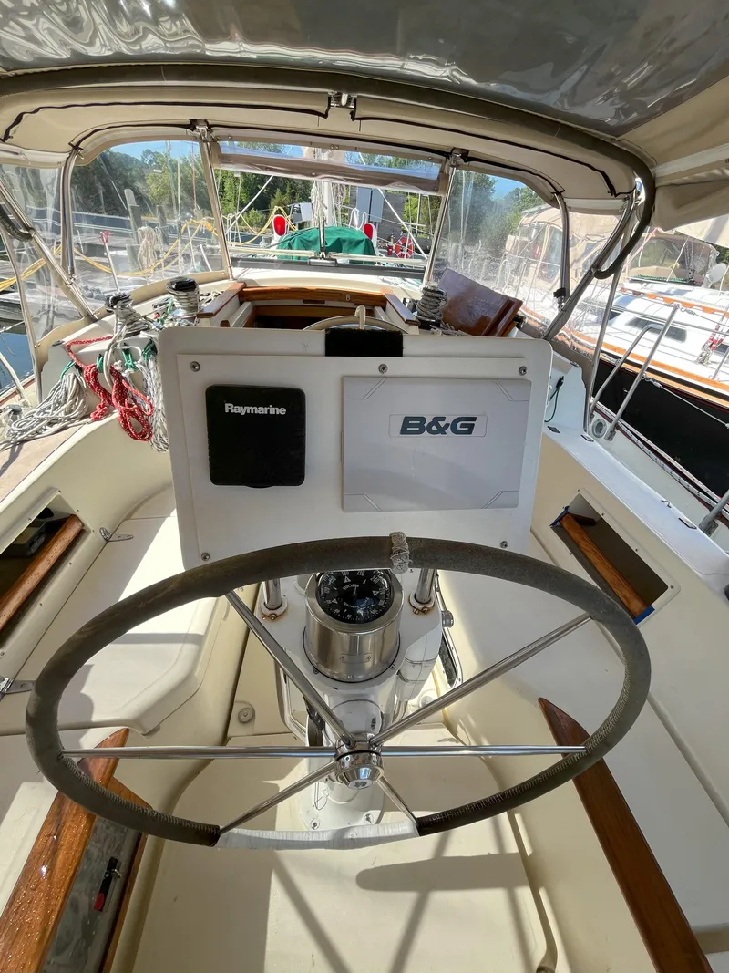 Slide: The Image of Cockpit of a 1998 Pacific Seacraft 40 yacht with Raymarine and B&G equipment. - 12