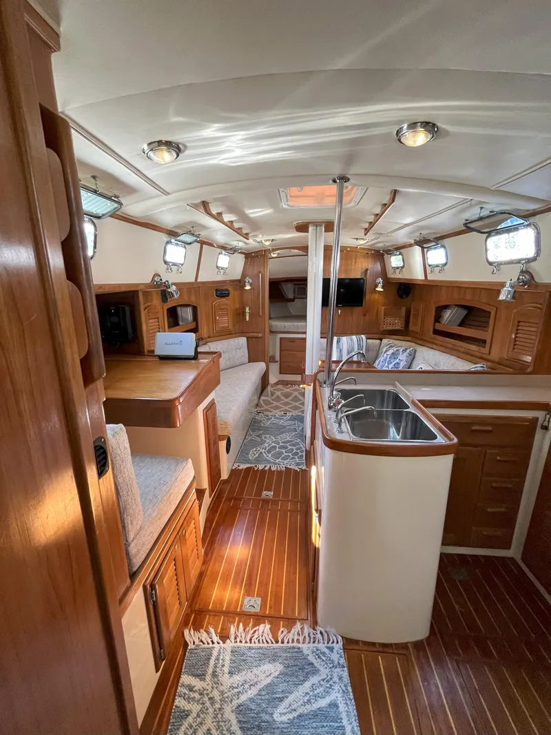Slide: The Image of Interior of a 1998 Pacific Seacraft 40 yacht with wooden furnishings. - 17