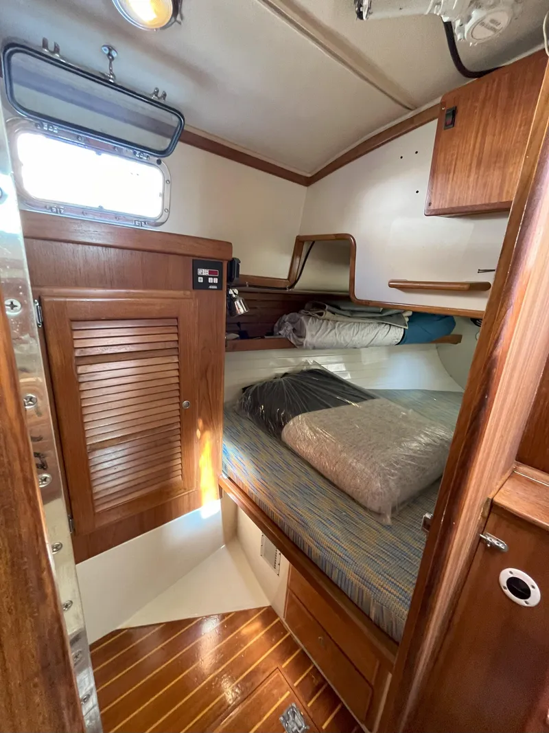 Slide: The Image of Interior of a 1998 Pacific Seacraft 40 yacht with wooden furnishings. - 19
