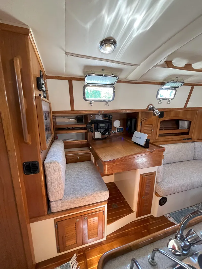 Slide: The Image of Interior of a 1998 Pacific Seacraft 40 yacht with wooden furnishings. - 21