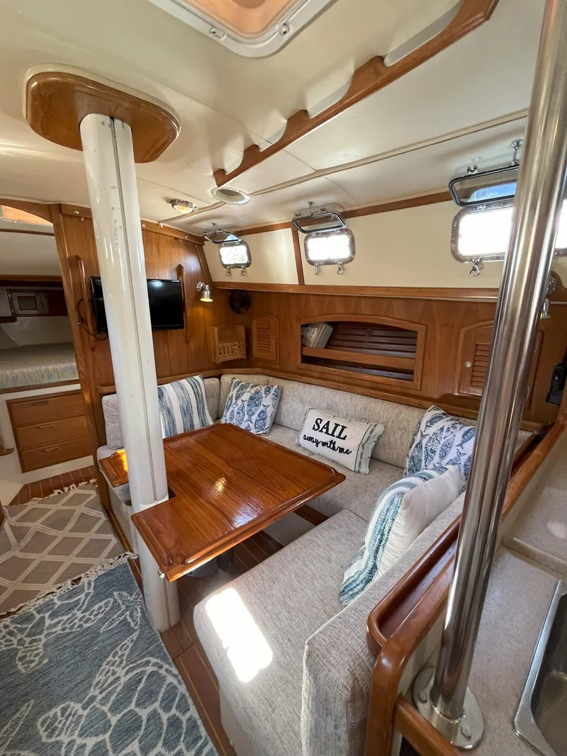 Slide: The Image of Interior of a 1998 Pacific Seacraft 40 yacht with cozy seating area. - 25