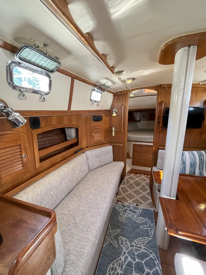 Slide: The Image of Interior of a 1998 Pacific Seacraft 40 yacht with wooden furnishings. - 26