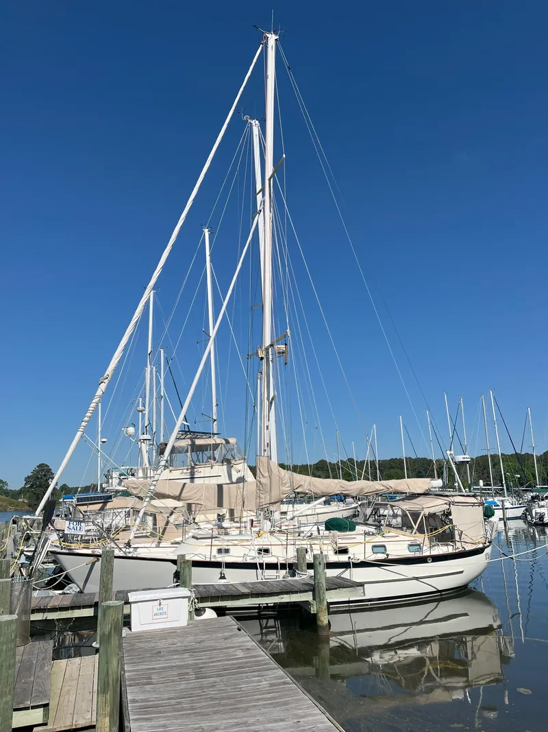 Slide: The Image of 1998 Pacific Seacraft 40 sailboat docked at marina. - 3