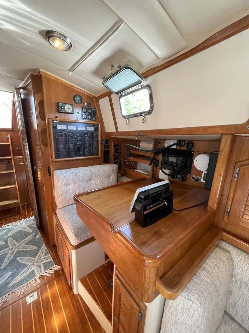 Slide: The Image of Interior of a 1998 Pacific Seacraft 40 yacht with navigation area. - 33