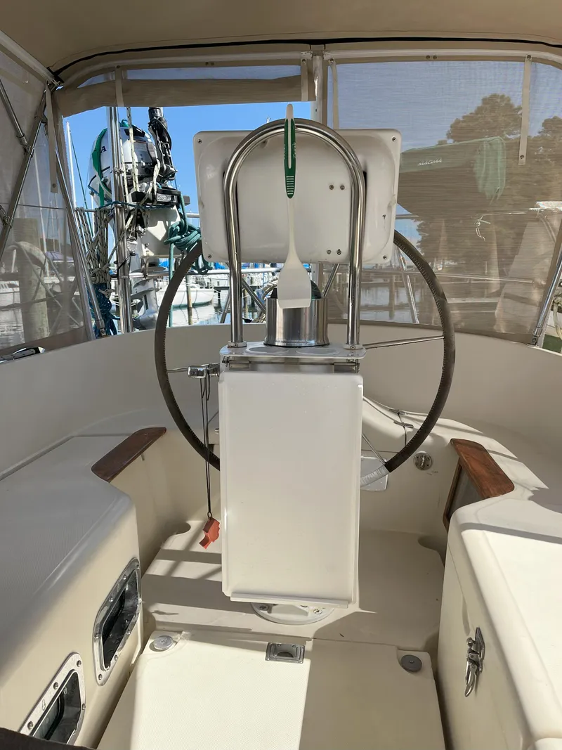 Slide: The Image of Cockpit of a 1998 Pacific Seacraft 40 yacht with steering wheel. - 38