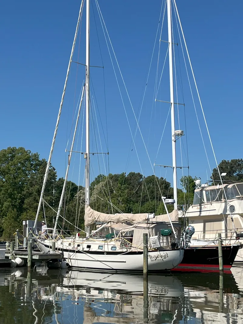 Slide: The Image of 1998 Pacific Seacraft 40 sailboat docked at marina. - 45