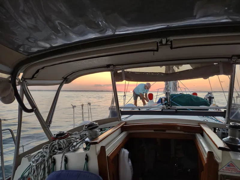 Slide: The Image of Man on Pacific Seacraft 40 yacht at sunset, 1998 model. - 46