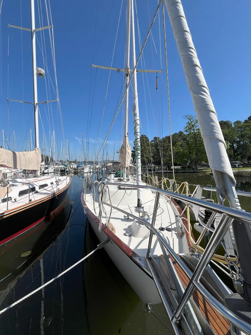 Slide: The Image of 1998 Pacific Seacraft 40 sailboat docked in marina. - 5