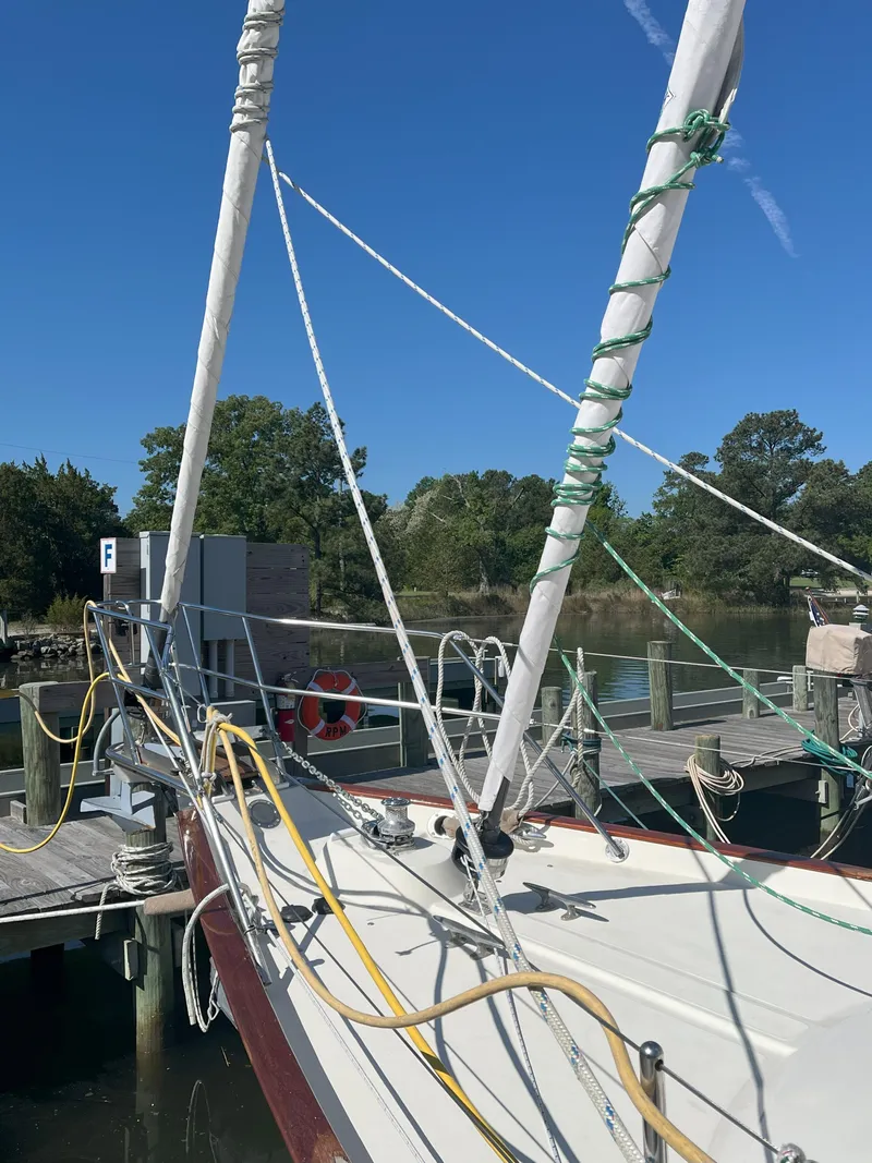 Slide: The Image of 1998 Pacific Seacraft 40 sailboat docked at marina. - 6