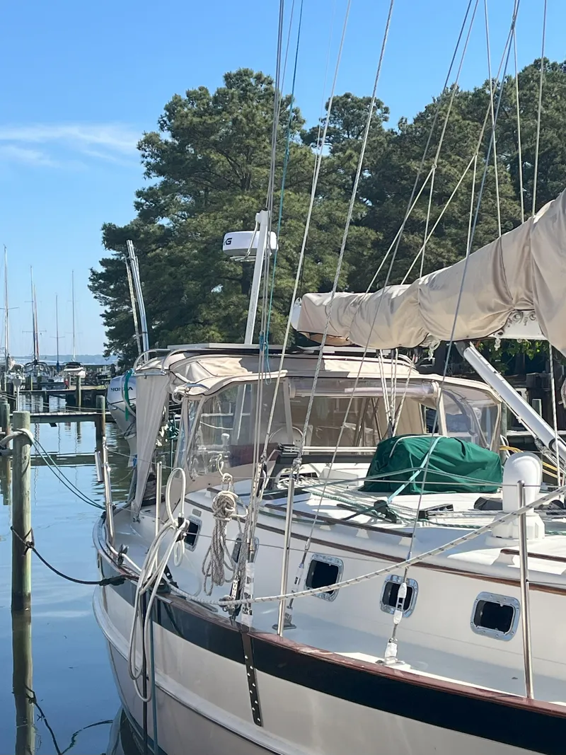 Slide: The Image of 1998 Pacific Seacraft 40 sailboat docked in marina. - 8