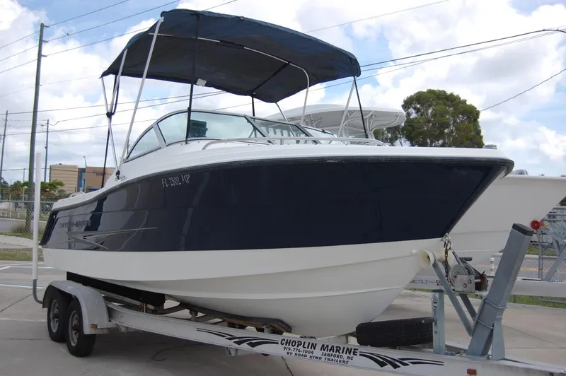 Slide: The Image of 2004 Hydra-Sports Lightning 202 DC boat on trailer with canopy. - 2