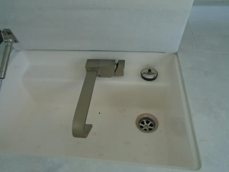 Slide: The Image of 2024 Regal 36XO boat sink with faucet and drain - 12