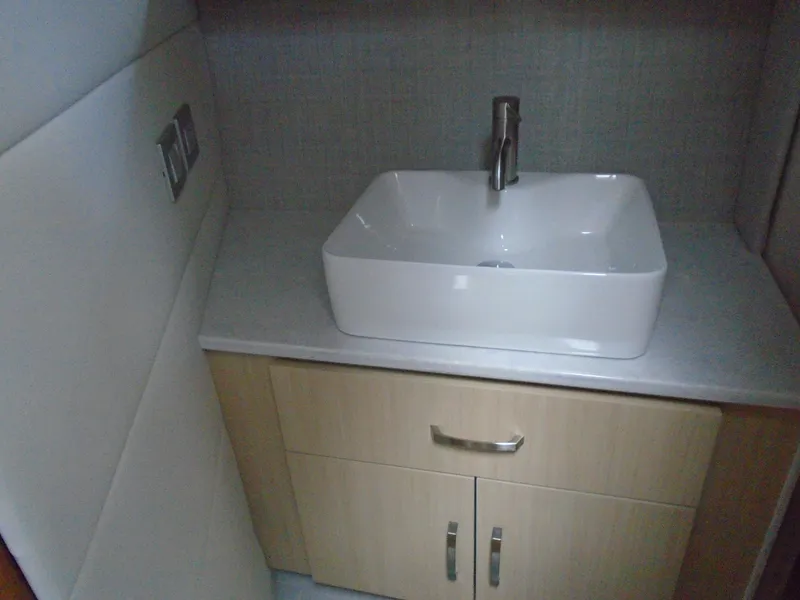 Slide: The Image of Modern sink in 2024 Regal 36XO boat bathroom. - 29