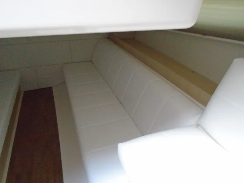 Slide: The Image of 2024 Regal 36XO interior cabin with white leather seating. - 35