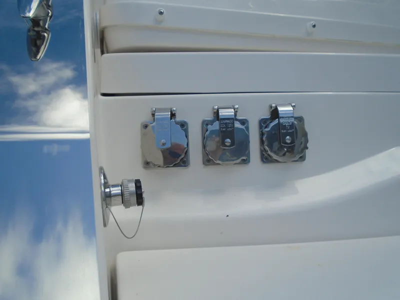 Slide: The Image of Close-up of 2024 Regal 36XO boat's chrome fittings and connectors. - 38
