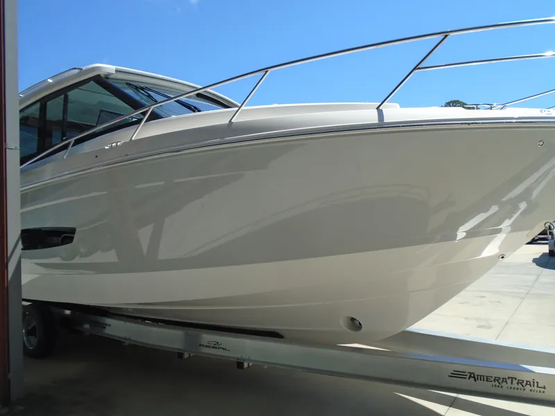 Slide: The Image of 2024 Regal 36XO boat on AmeraTrail trailer, side view. - 42