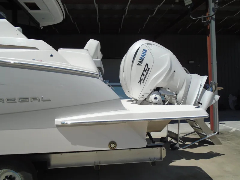 Slide: The Image of 2024 Regal 36XO boat with Yamaha outboard engine. - 47