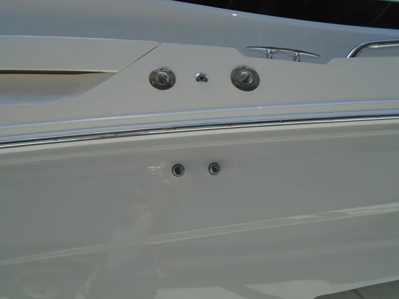 Slide: The Image of 2024 Regal 36XO boat exterior detail showing hull and fittings. - 51