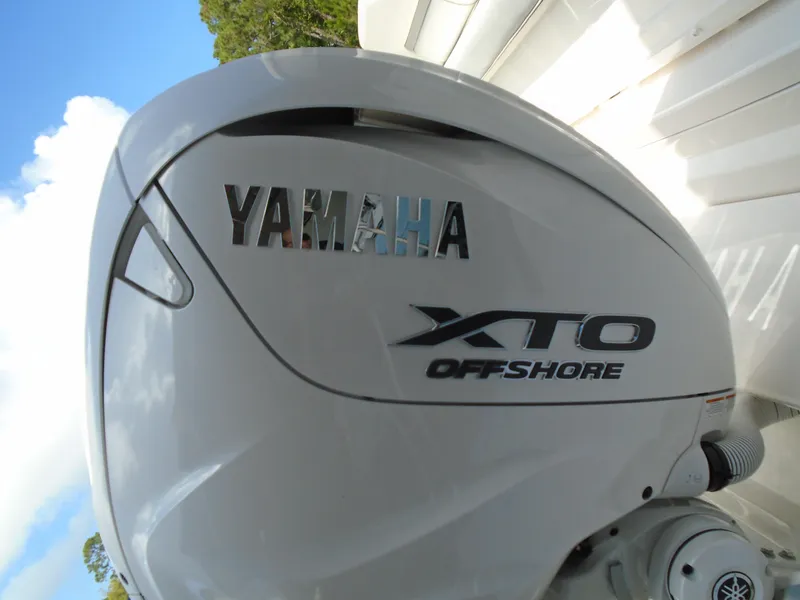 Slide: The Image of Close-up of Yamaha XTO Offshore engine on 2024 Regal 36XO boat. - 6
