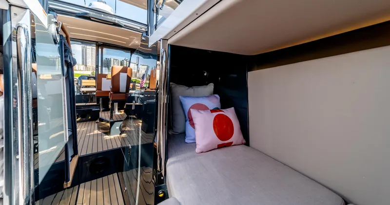 Slide: The Image of Interior cabin of 2025 Arksen 30 yacht with cozy bed and decorative pillows. - 47