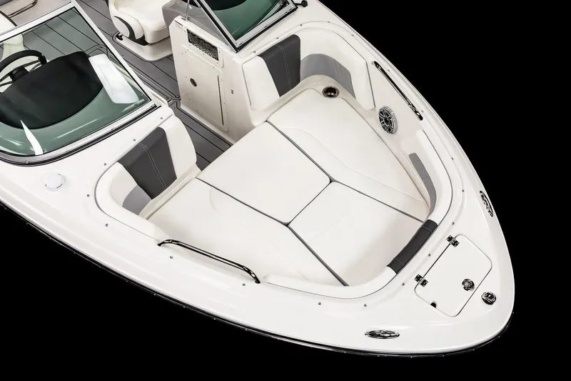 Slide: The Image of 2025 Chaparral 21 Surf boat interior, white seating, and sleek design. - 3