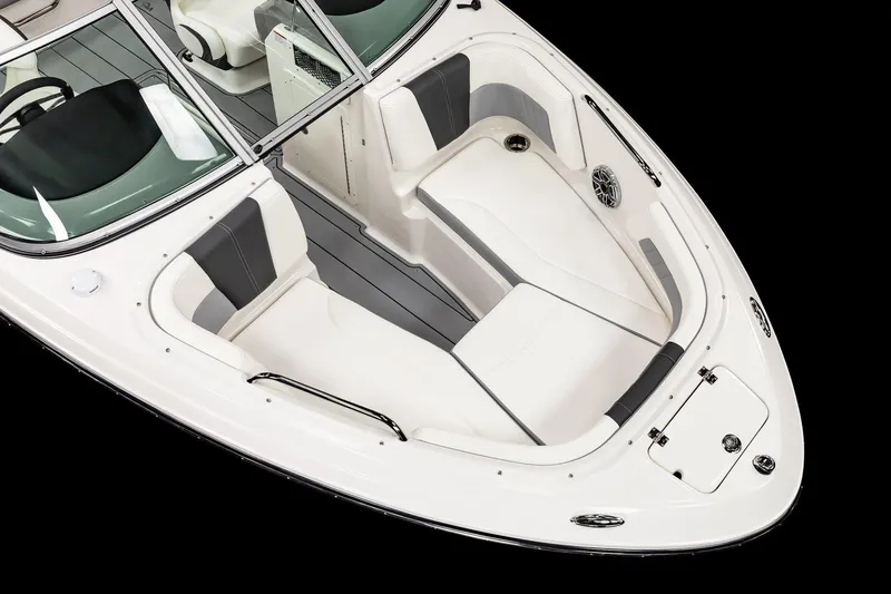 Slide: The Image of 2025 Chaparral 21 Surf boat interior with white and gray seating. - 4
