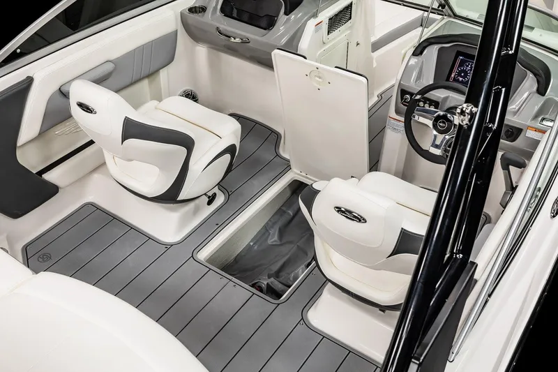 Slide: The Image of Interior of 2025 Chaparral 21 Surf boat with modern seating and dashboard. - 7