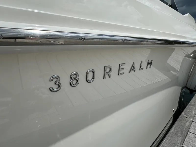 Slide: The Image of 2020 Boston Whaler 380 Realm boat nameplate on the side hull. - 14