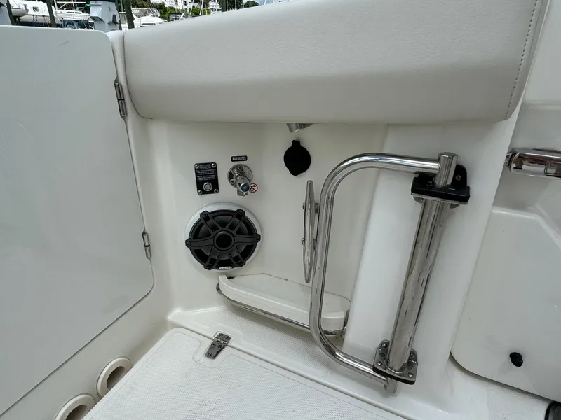 Slide: The Image of Interior detail of a 2020 Boston Whaler 380 Realm boat showing a speaker and control panel. - 18