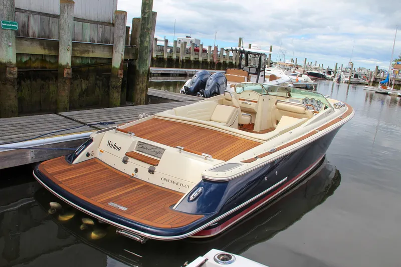 Slide: The Image of 2013 Chris-Craft Launch 28 boat with teak deck, docked in Greenwich, CT. - 1