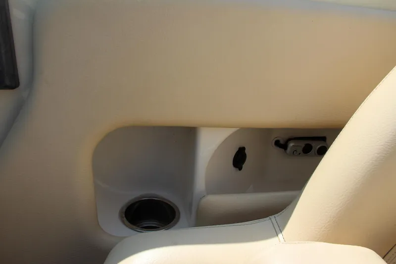 Slide: The Image of Dashboard of a 2013 Chris-Craft Launch 28 boat with navigation controls. - 19