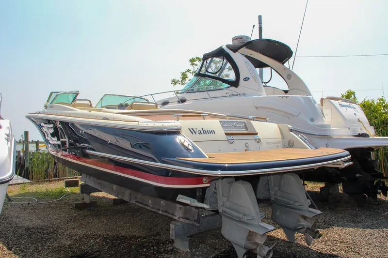 Slide: The Image of 2013 Chris-Craft Launch 28 boat interior with toilet and seating area. - 29
