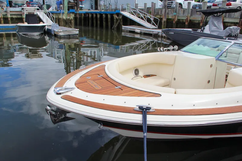 Slide: The Image of 2013 Chris-Craft Launch 28 dashboard with Volvo Penta display and controls. - 43