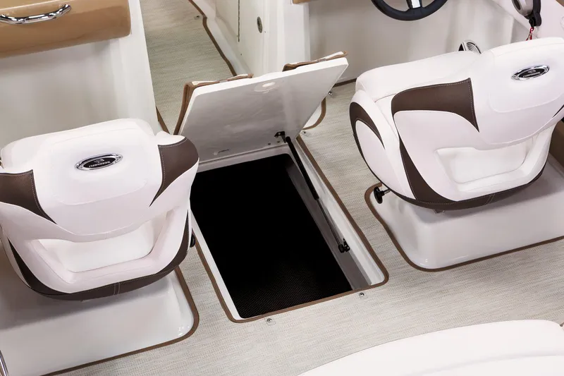 Slide: The Image of Interior of 2026 Chaparral 21 SSi OB with helm console. - 9