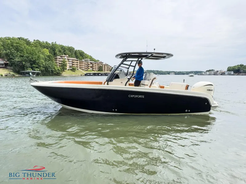 The Image of 2024 Capoforte FX240 boat on water, side view, with Big Thunder Marine logo. - 1