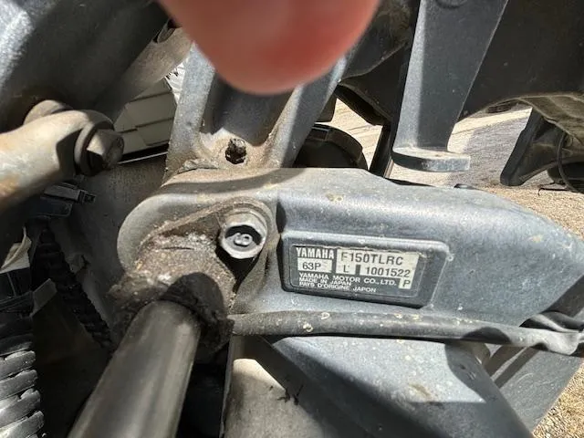 Slide: The Image of Close-up of a Yamaha F150TLRC motor on a 2004 Crestliner 2485 LSI boat. - 5