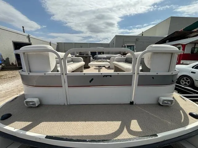 Slide: The Image of 2004 Crestliner 2485 LSI pontoon boat with spacious seating and open deck. - 6
